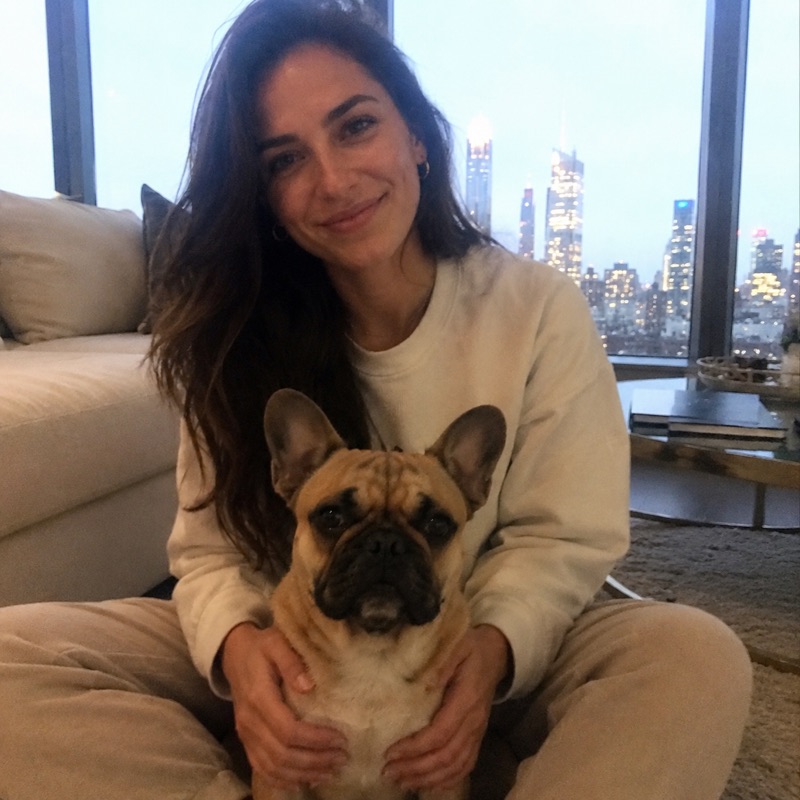 Alyssa R. with Nala, a 3-year-old French Bulldog, in a New York apartment